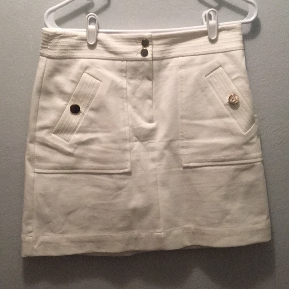 Loft White skirt with zippered front. 18 in long